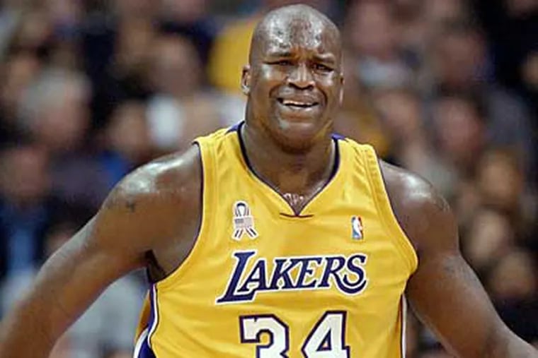 Shaquille O'Neal averaged 33 points and 15.8 rebounds per game against the 76ers in the 2001 NBA Finals. (AP file photo)