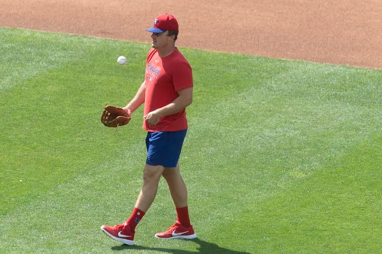 Jay Bruce practicing Tuesday at Citizens Bank Park. Bruce expects to receive the lion's share of his at-bats this season as the Phillies' designated hitter.