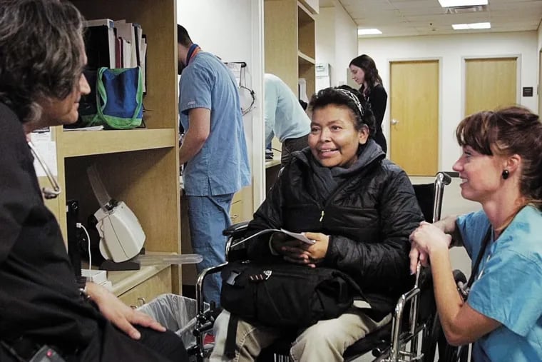 Dr. Steven Larson (left) with patient Mery Martinez and then-medical student Daphne Owen in a scene from the HBO documentary “Clinica de Migrantes,” about Philadelphia’s Puentes de Salud, a clinic that treats undocumented and uninsured immigrants.