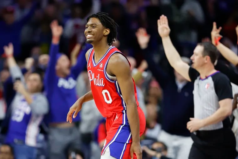 Sixers guard Tyrese Maxey celebrates after hitting a three-point basket against the Miami Heat late in the fourth quarter.