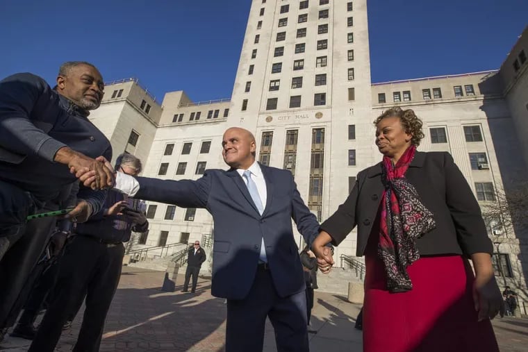 Frank Moran (center)  outside Camden City Hall last March when Mayor Dana Redd (right) announced she would  not seek a third term.  Moran, the longtime president of city council, was elected mayor last November and takes office Jan. 1.