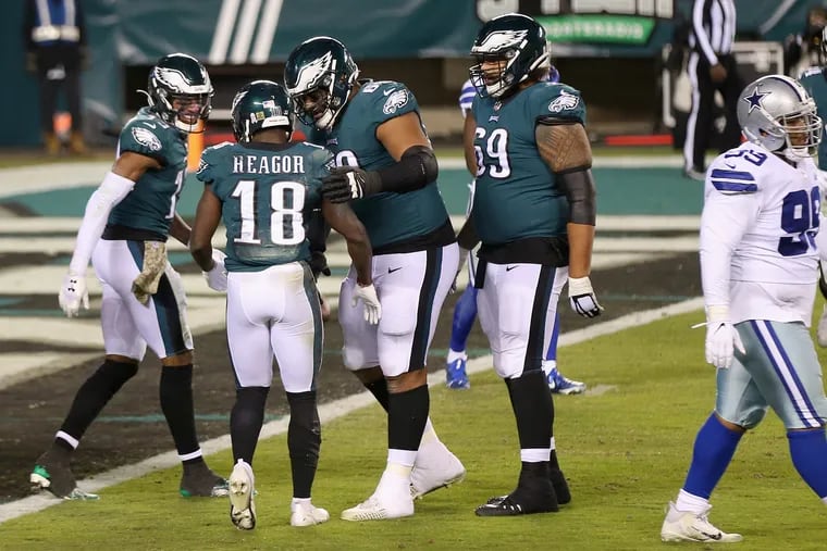 Eagles wide receiver Jalen Reagor (18) celebrated after scoring a two-point conversion against Dallas on Nov. 1. His return could ignite the Eagles offense.