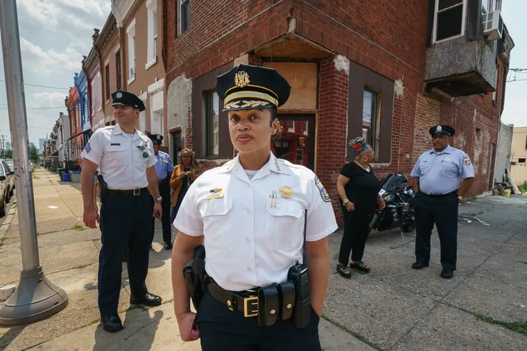 Police Commissioner Danielle Outlaw shown here on the 2400 block of North 18th Street, in a "pinpoint zone." Outlaw announced her resignation Tuesday after three and a half years with the department.