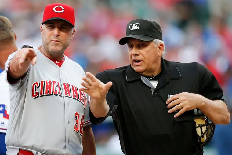 Former Cincinnati Reds manager Bryan Price has been hired as the Phillies' pitching coach under new manager Joe Girardi.