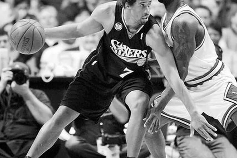 The Sixers&#0039; Andre Miller drives by Chicago&#0039;s Ben Gordon. Miller is averaging 13.7 shots a game.