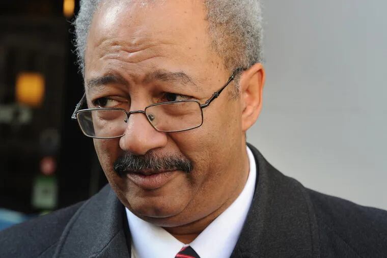 Congressman Chaka Fattah answers questions outside Tavern 17, where he hosted a fundraising birthday party breakfast for a small number of donors and supporters Dec. 17, 2014.   ( CLEM MURRAY / Staff Photographer )