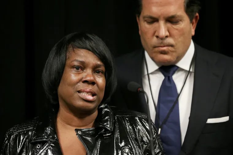Meek Mill’s mother, Kathy Williams, and his attorney, Joe Tacopina, speak during a news conference before a panel about criminal justice reform at the University of Pennsylvania’s Irvine Auditorium on Tuesday, March 13, 2018.