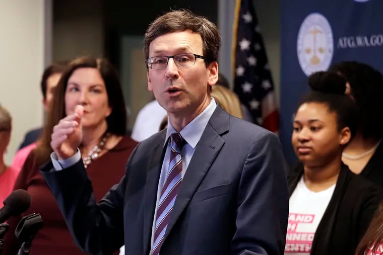 In this Feb. 25, 2019 file photo, Washington state Attorney General Bob Ferguson speaks at a news conference announcing a lawsuit challenging the Trump administration's Title X "gag rule" in Seattle.