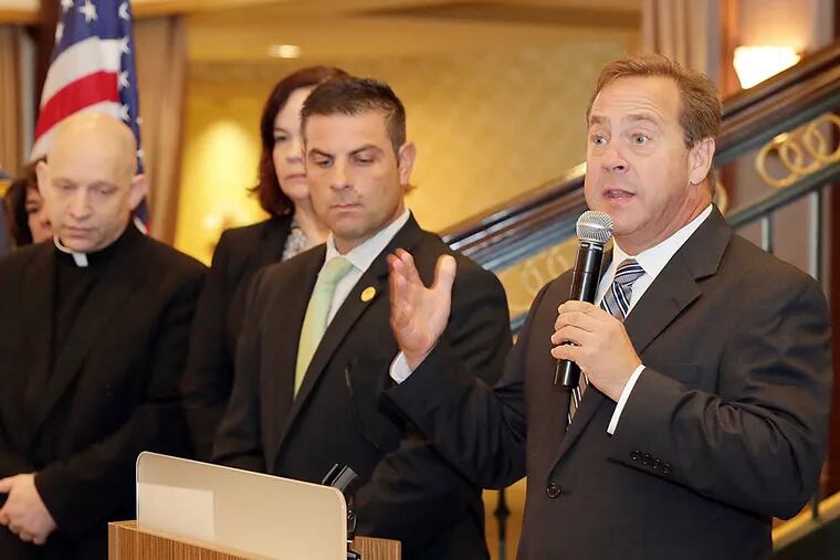 Freeholder Director, Louis Cappelli (right) announces Operation SAL at the Collingswood Grand Ballroom. (AKIRA SUWA / For The Inquirer)