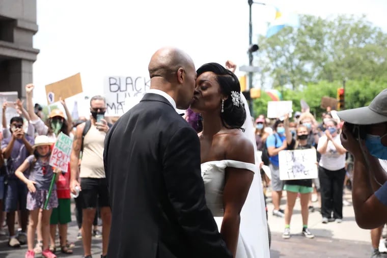 Kerry Anne and Michael Gordon came out to show their support for Black Lives Matter and the protest over the death of George Floyd on their wedding day along 16th Street and Benjamin Parkway on Saturday June 6, 2020.