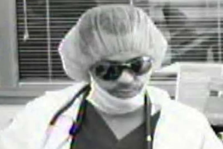 The "Mummy Bandit" at the Sovereign Bank in Wyndmoor. (FBI)