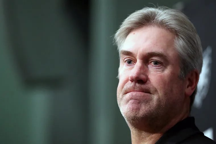 Eagles head coach Doug Pederson listens to a question during his press conference Monday.