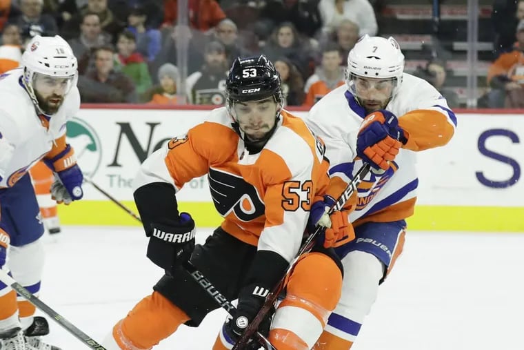 Flyers defenseman Shayne Gostisbehere (53), skating after the puck in a recent game, will return to the lineup Tuesday against the Rangers.