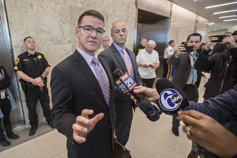 Craig Penglase (left) and Niels Eriksen (right), defense attorneys for Sean Kratz, speak briefly to the media after their client, Sean Kratz, unexpectedly rejected the guilty plea deal that had been worked out and decided to plead not guilty, at the Bucks County Justice Center on May 16, 2018.