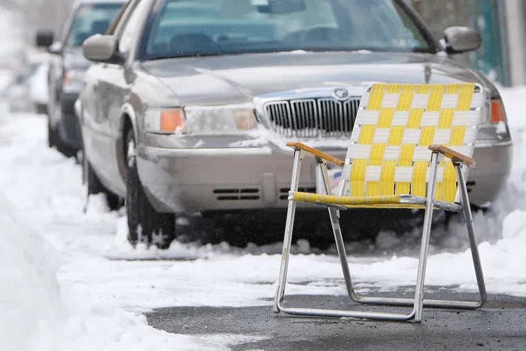 Winter in South Philly, where shoveled parking spots are protected with lawn chairs.