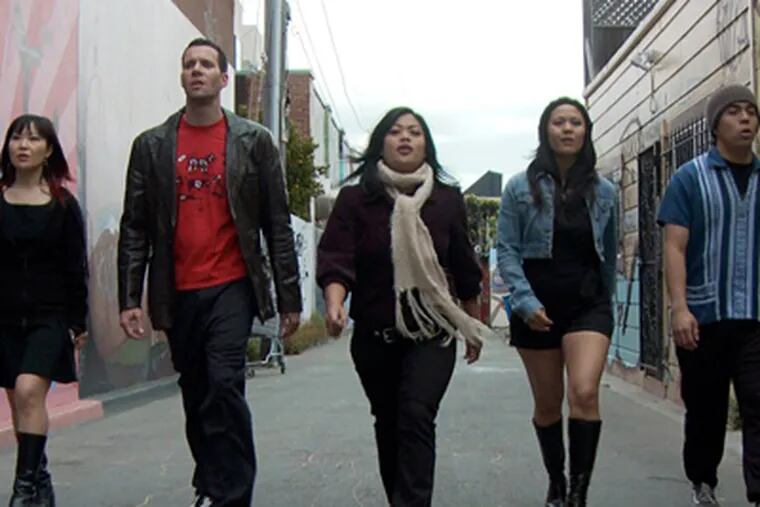In "Fruit Fly," a tribute to San Francisco, (from left) E.S. Park, Mike Curtis, L.A. Renigen, Theresa Navarro, and Aaron Zaragoza march down an alley singing. H.P. Mendozza directed the film and will receive the Rising Star Award.