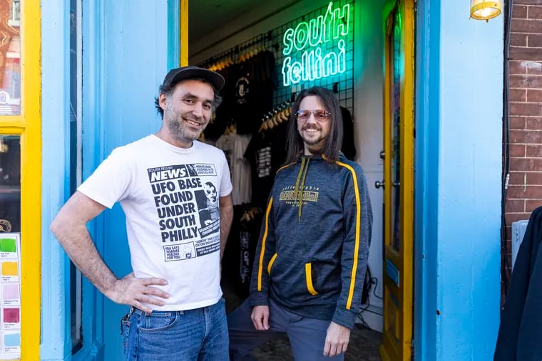 Tony Trov (left) and Johnny Zito, owners of South Fellini, celebrated the reopening of the Passyunk Avenue shop.