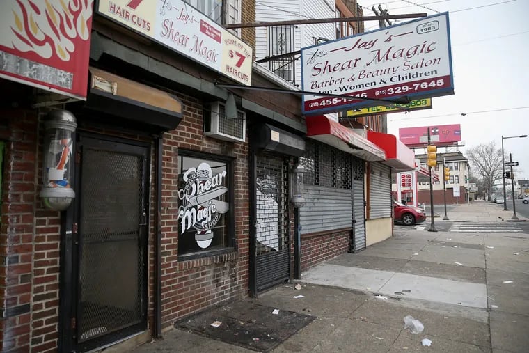 Jay's Shear Magic barbershop is pictured in the 4500 block of North Broad Street in North Philadelphia on Friday, Dec. 14, 2018. Four people were shot at the barbershop, one fatally, the night before. TIM TAI / Staff Photographer