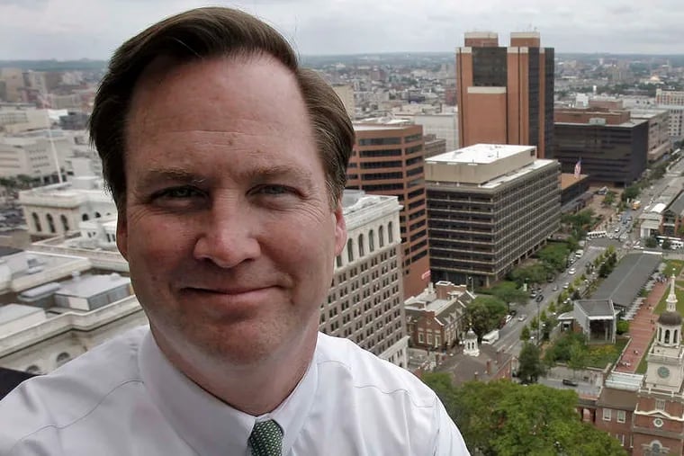 CEO of the Beneficial Bank, Gerry Cuddy poses for a photo on a balcony overlooking Independence Square. 06/19/2009 (Akira Suwa / Staff Photographer )