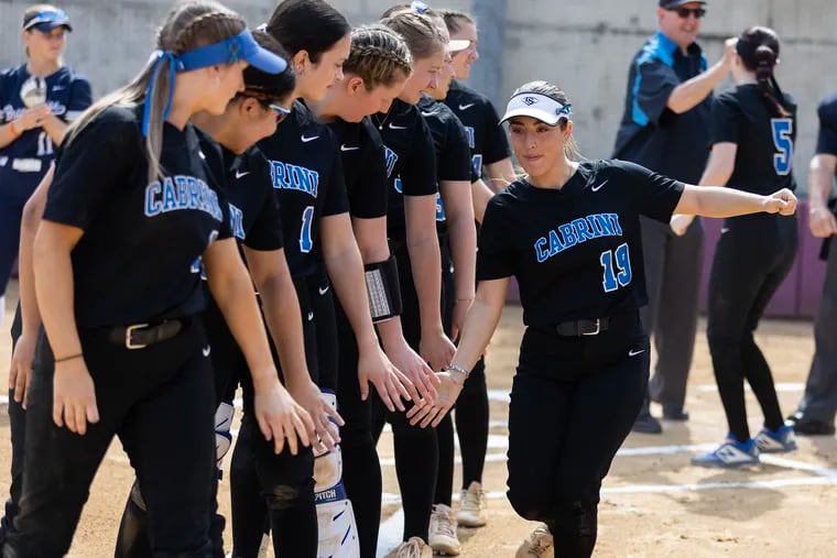 When Cabrini University announced last summer that it would close at the end of this academic year, the women's softball team roster dwindled from 20 players to nine, just like that. Sam Taddei is introduced before their double header against Penn State Brandywine on April 16, 2024