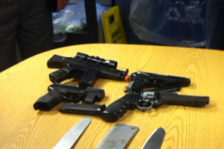 BB guns and knives officers say they seized from Darryl Donahue, allegedly seen carrying the weapons on the Broad Street Line.