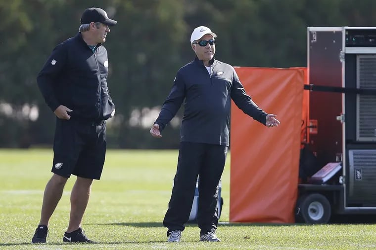 Eagles owner Jeffrey Lurie (right) has shown signs of frustration with the direction of his team, but can coach Doug Pederson (left) still turn things around?