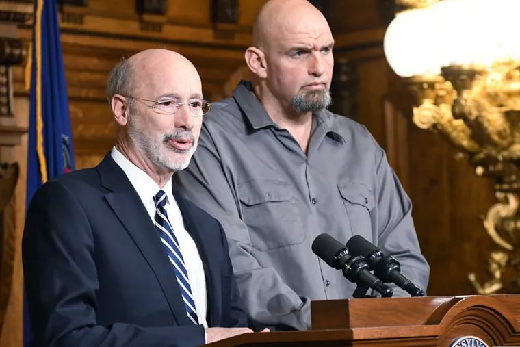 Gov. Tom Wolf of Pennsylvania speaks at a news conference with Lt. Gov. John Fetterman in his Capitol reception room in January in Harrisburg.