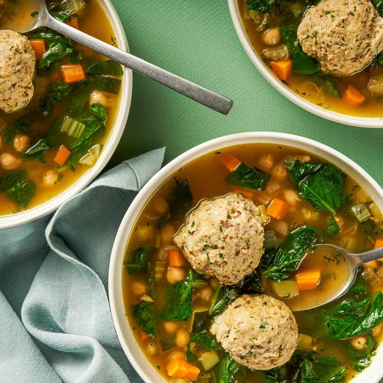Matzoh Ball Soup With Vegetables, Chickpeas and Herbs. MUST CREDIT: Rey Lopez for The Washington Post; food styling by Lisa Cherkasky for The Washington Post