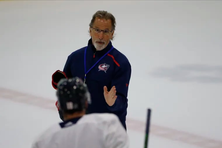 John Tortorella giving one-on-one instruction at practice while with the Columbus Blue Jackets.