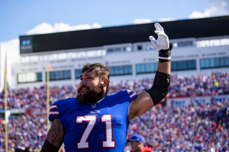 Buffalo Bills offensive tackle Ryan Bates exciting the crowd from the bench during a game against the Washington Football Team on Sept. 26, 2021, in Orchard Park, N.Y.