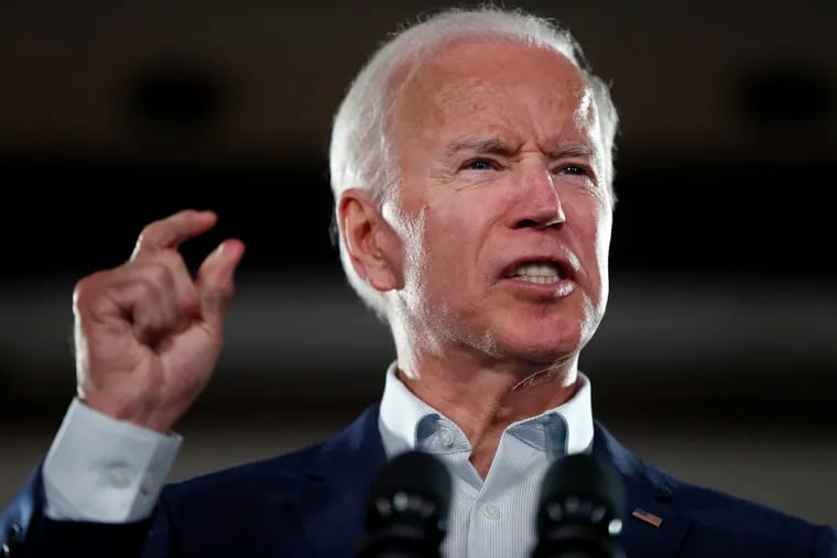 Former Vice President Joe Biden speaks during an October rally in Bridgeton, Mo. Biden says he'll announce within the next two months whether he plans to challenge President Donald Trump in 2020.