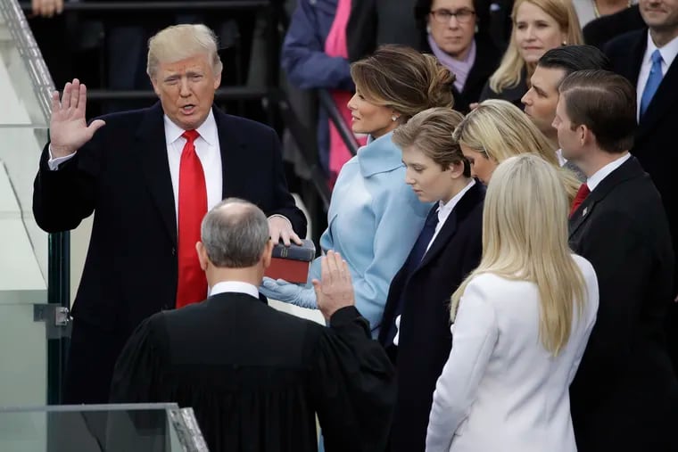 Donald Trump was sworn in as the 45th president of the United States by Chief Justice John Roberts as Melania Trump looks on during the 58th Presidential Inauguration at the U.S. Capitol in Washington on Jan. 20, 2017.