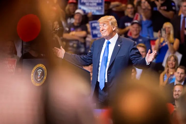 President Trump appears at a campaign rally for U.S. Rep. Lou Barletta at the Mohegan Sun Arena in Wilkes-Barre August 2, 2018.
