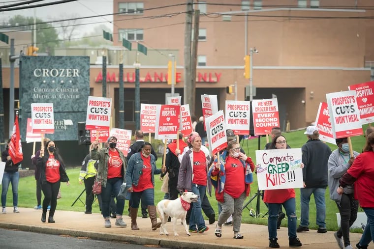 Frontline health-care professionals, nurses, paramedics, technical specialists, and professionals, protested service shutdowns and unit closures last spring at the Prospect Health System outside Crozer Hospital, in Upland, Pa.