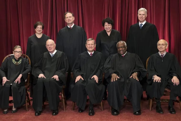 FILE – In this June 1, 2017, file photo, the justices of the U.S. Supreme Court gather for an official group portrait to include new Associate Justice Neil Gorsuch, top row, far right at the Supreme Court Building in Washington. Seated, from left are, Associate Justice Ruth Bader Ginsburg, Associate Justice Anthony M. Kennedy, Chief Justice John Roberts, Associate Justice Clarence Thomas, and Associate Justice Stephen Breyer. Standing, from left are, Associate Justice Elena Kagan, Associate Justice Samuel Alito Jr., Associate Justice Sonia Sotomayor, and Associate Justice Neil Gorsuch. In different circumstances, Ginsburg might be on a valedictory tour in her final months on the Supreme Court. But in the era of Donald Trump, the 84-year-old Ginsburg is packing her schedule and sending signals she intends to keep her seat on the bench for years. (AP Photo/J. Scott Applewhite, File)