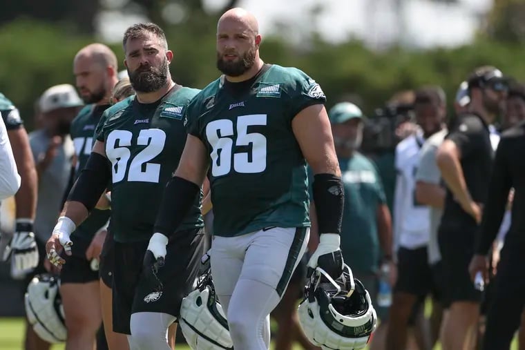 Eagles offensive linemen Jason Kelce and Lane Johnson finish practice together during training camp at the NovaCare Complex in Philadelphia on Friday, July 28, 2023.