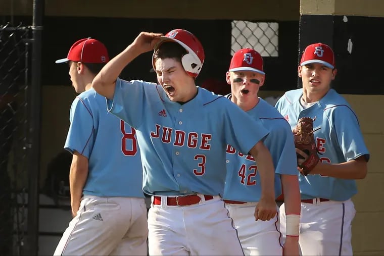Shawn LeVan (3) lets out a yell after he scored in the seventh inning to put Father Judge ahead of Neumann-Goretti, 3-2.