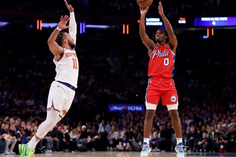 Tyrese Maxey #0 of the Philadelphia 76ers shoots a three point shot as Jalen Brunson #11 of the New York Knicks defends during the first half in game one of the Eastern Conference First Round Playoffs at Madison Square Garden on April 20, 2024 in New York City.