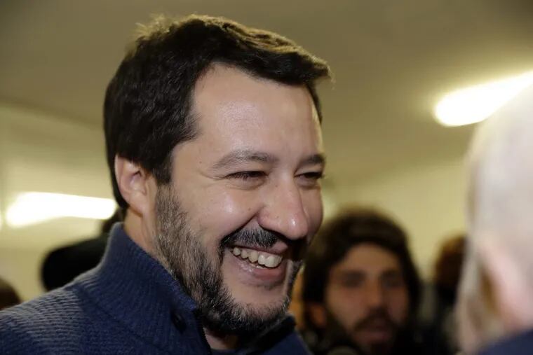 Leader of the League party, Matteo Salvini, smiles before casting his ballot at a polling station in Milan, Italy, Sunday, March 4, 2018.