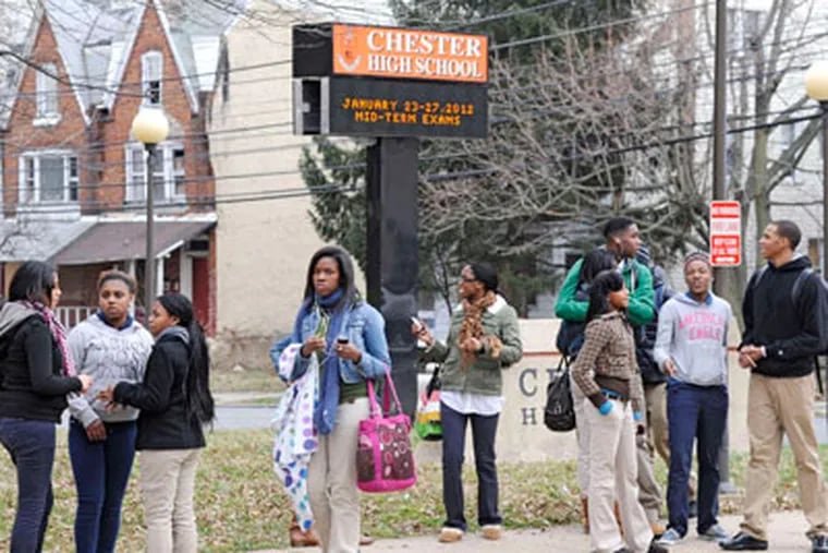 Chester High students after dismissal. District students will finish the year, but "the present structure is simply unsustainable," Gov. Corbett and Sen. Dominic Pileggi (R., Del.) have said. (Clem Murray / Staff)