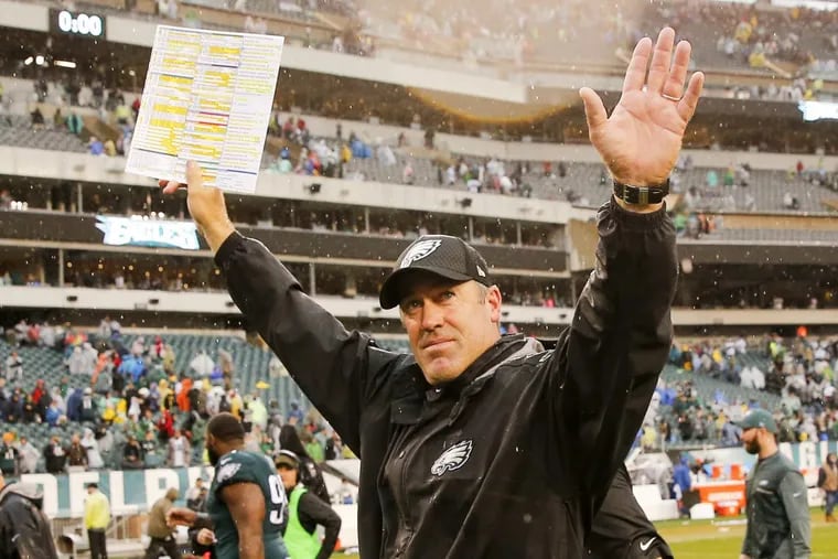Eagles coach Doug Pederson celebrates his team’s 33-10 win over the San Francisco 49ers at Lincoln Financial Field on Sunday.