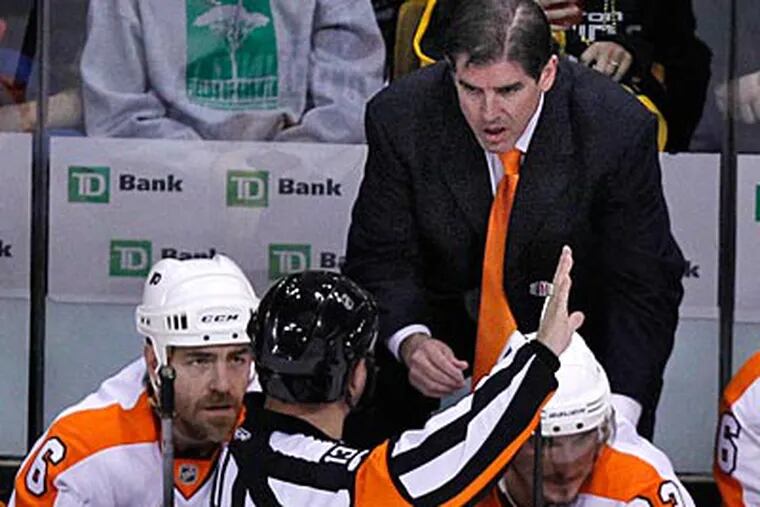 "I've never been one to use injuries as an excuse," Flyers coach Peter Laviolette said. (Ron Cortes/Staff Photographer)