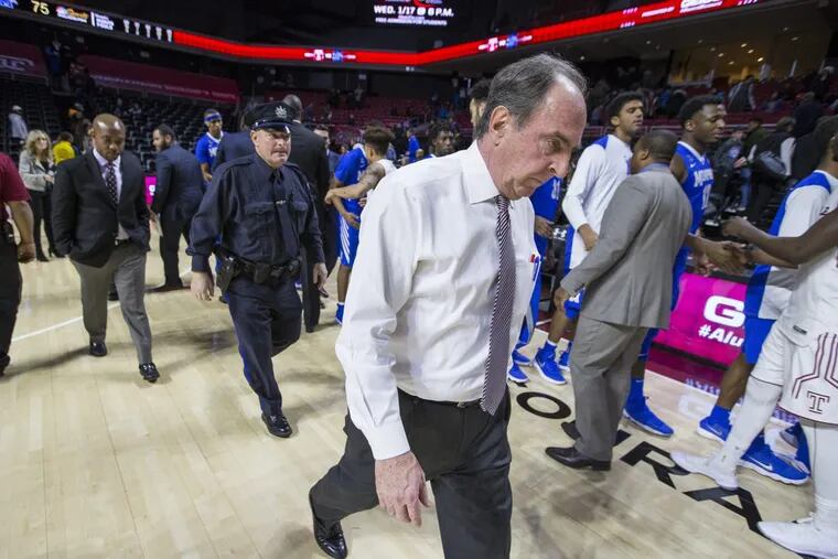 Coach Fran Dunphy walkiing off the court after Temple’s overtime loss to Memphis on Jan. 13.