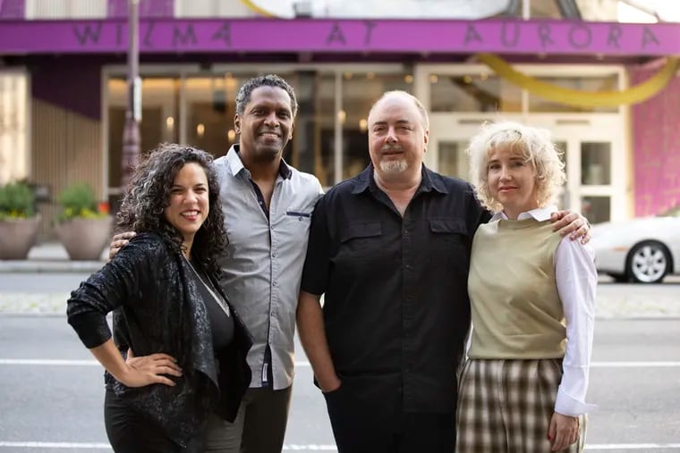 Wilma Theater managing director Leigh Goldenberg (from left) and co-artistic directors Lindsay Smiling, Yury Urnov, and Morgan Green outside the theater in Philadelphia.