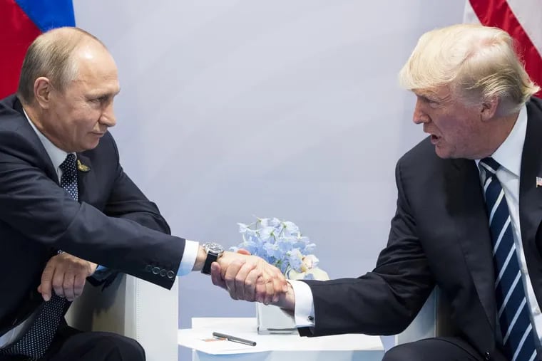 U.S. President Donald Trump (right) and Russian President Vladimir Putin met during the G20 summit in Hamburg, Germany, on Friday.