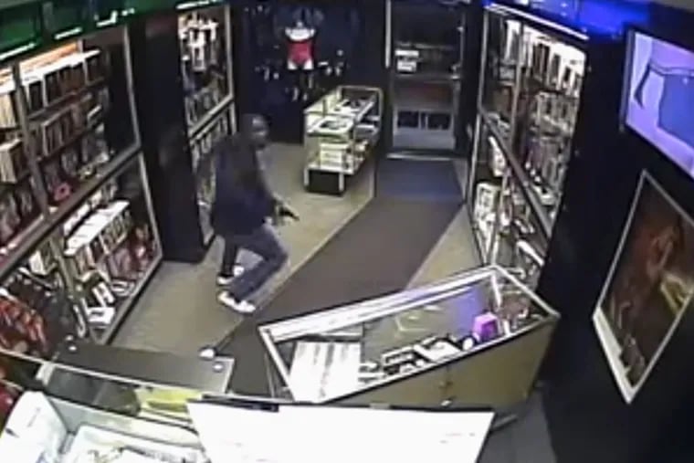 Police released surveillance video of a man wanted in the shooting of a clerk at Danny's Midnight Confessions in Center City.
