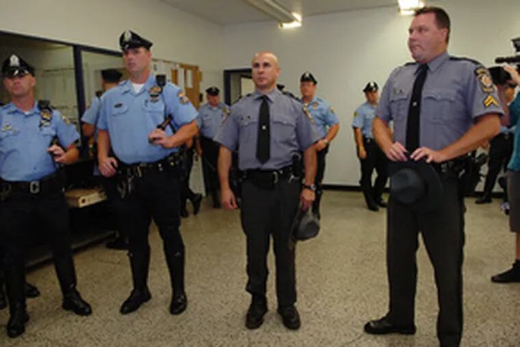 Getting ready to go out on patrol on the city&#0039;s streets are (from left) Philadelphia Police Officers Joe Hanson and Chris Culver, and state troopers Michael Perillo and George Garris.