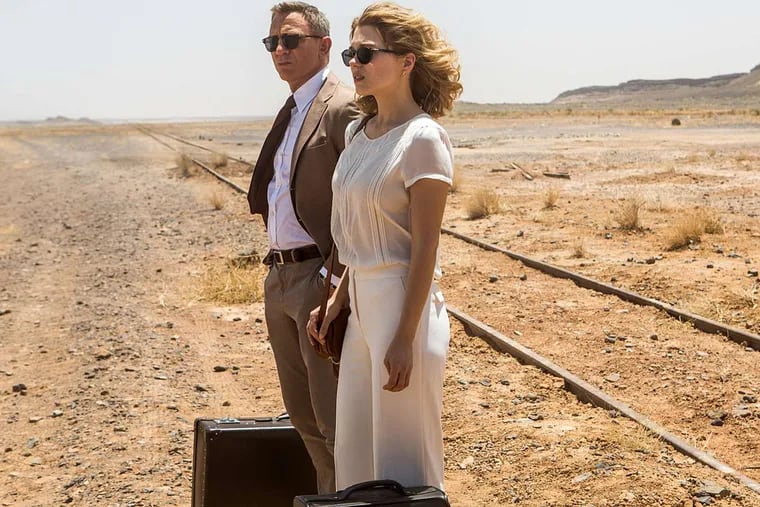Daniel Craig, left, and Lea Seydoux appear in a scene from the James Bond film, "Spectre."