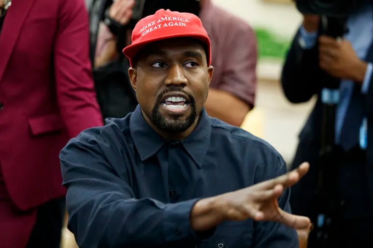 Rapper Kanye West attends a meeting in the Oval Office of the White House with President Donald Trump in October 2018.