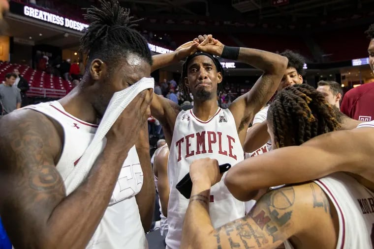 Temple’s loss to Tulsa was the final home game for seniors like Quinton Rose, center, at the Liacouras Center on March 4, 2020. De’Vondre Perry is left and Alani Moore is right.